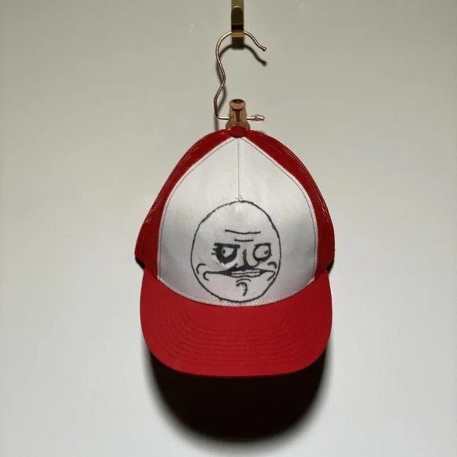 The Classics  Yupoong Red  White Drawing Face Trucker Snapback Hat One Size